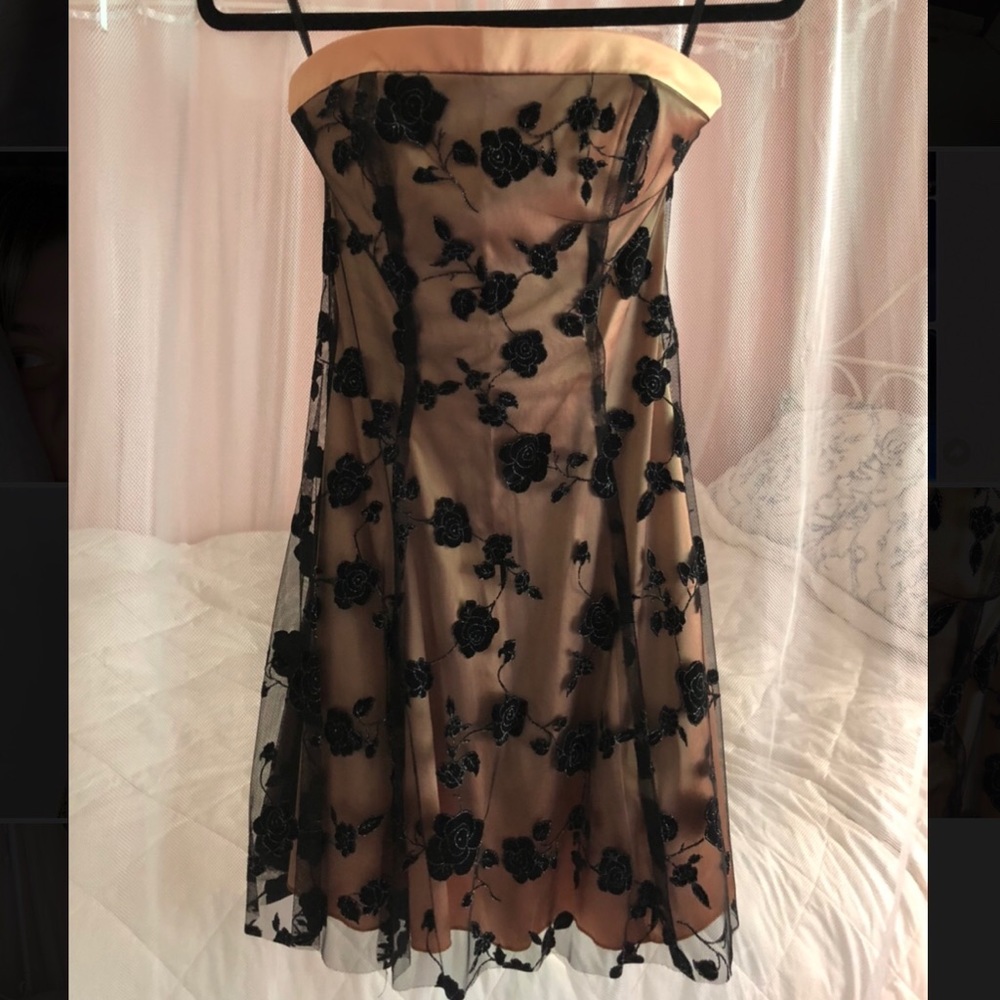 Golden dress with black floral lace design